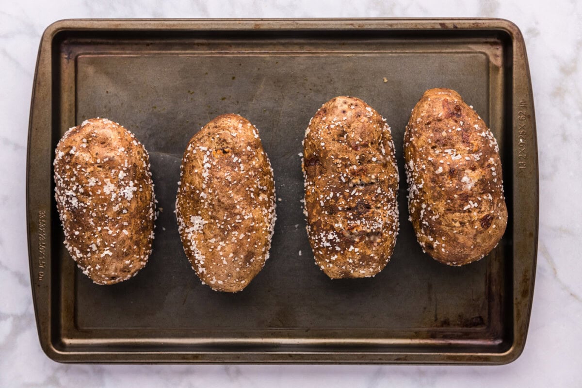 crispy baked potatoes on a baking sheet