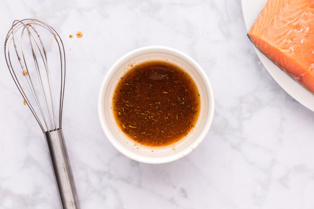 olive oil mixed with cajun seasoning in a bowl