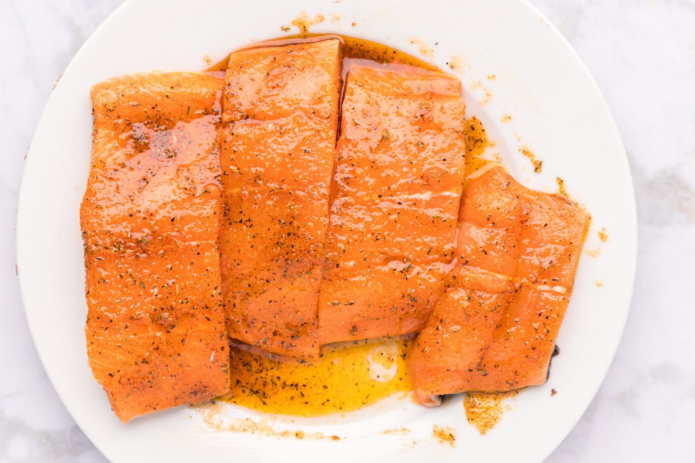 salmon filets with cajun seasoning and olive oil