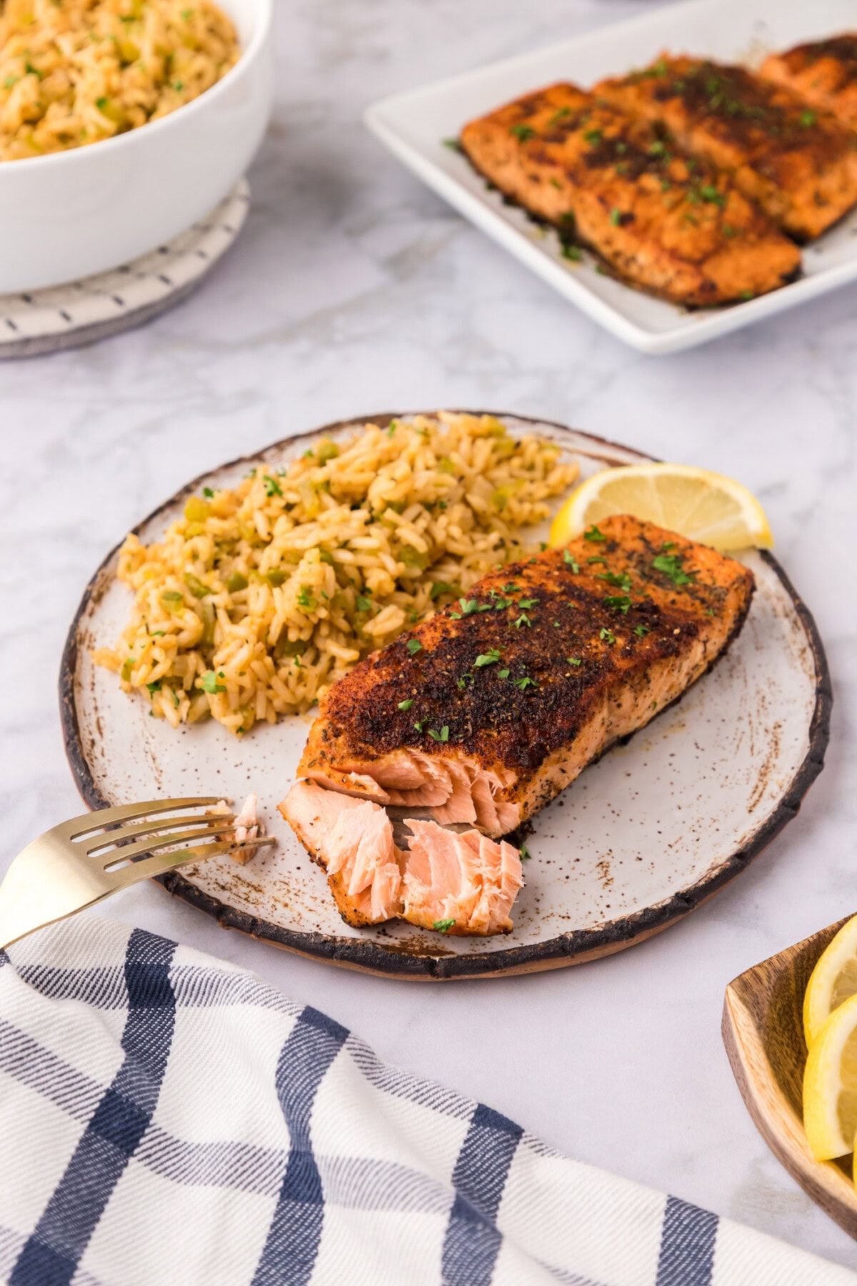 Cajun Salmon on a plate with cajun rice