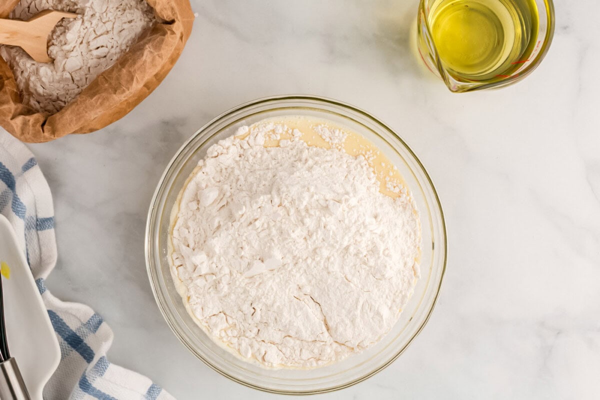 adding dry ingredients to wet ingredients
