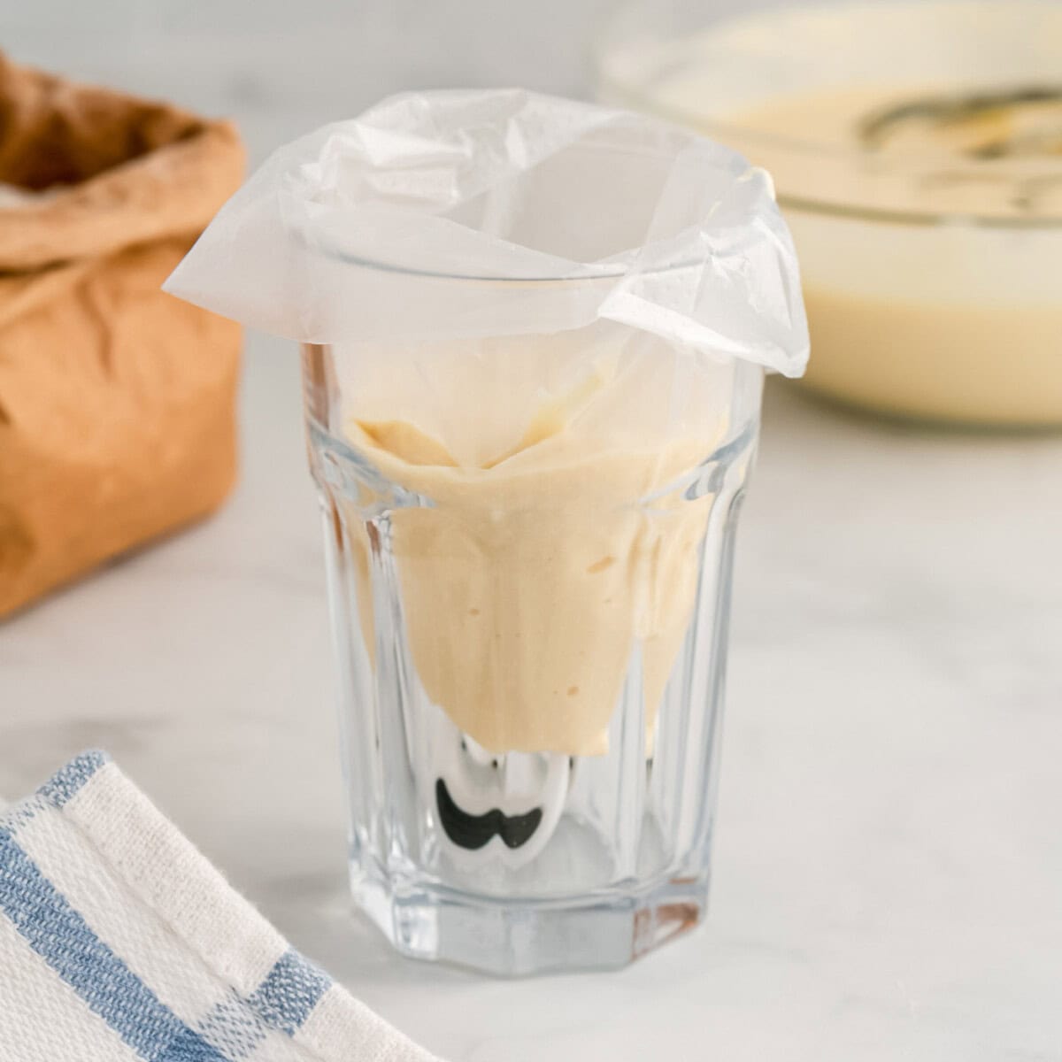 funnel cake batter in a piping bag
