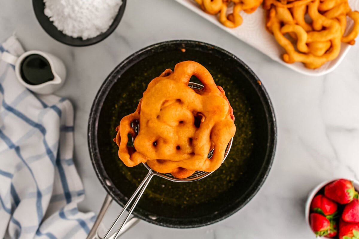 removing funnel cake from oil