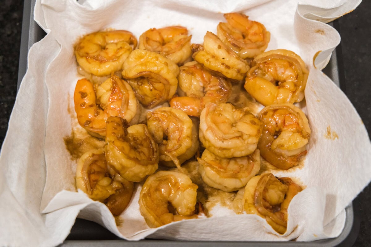 hibachi shrimp draining on a paper towel