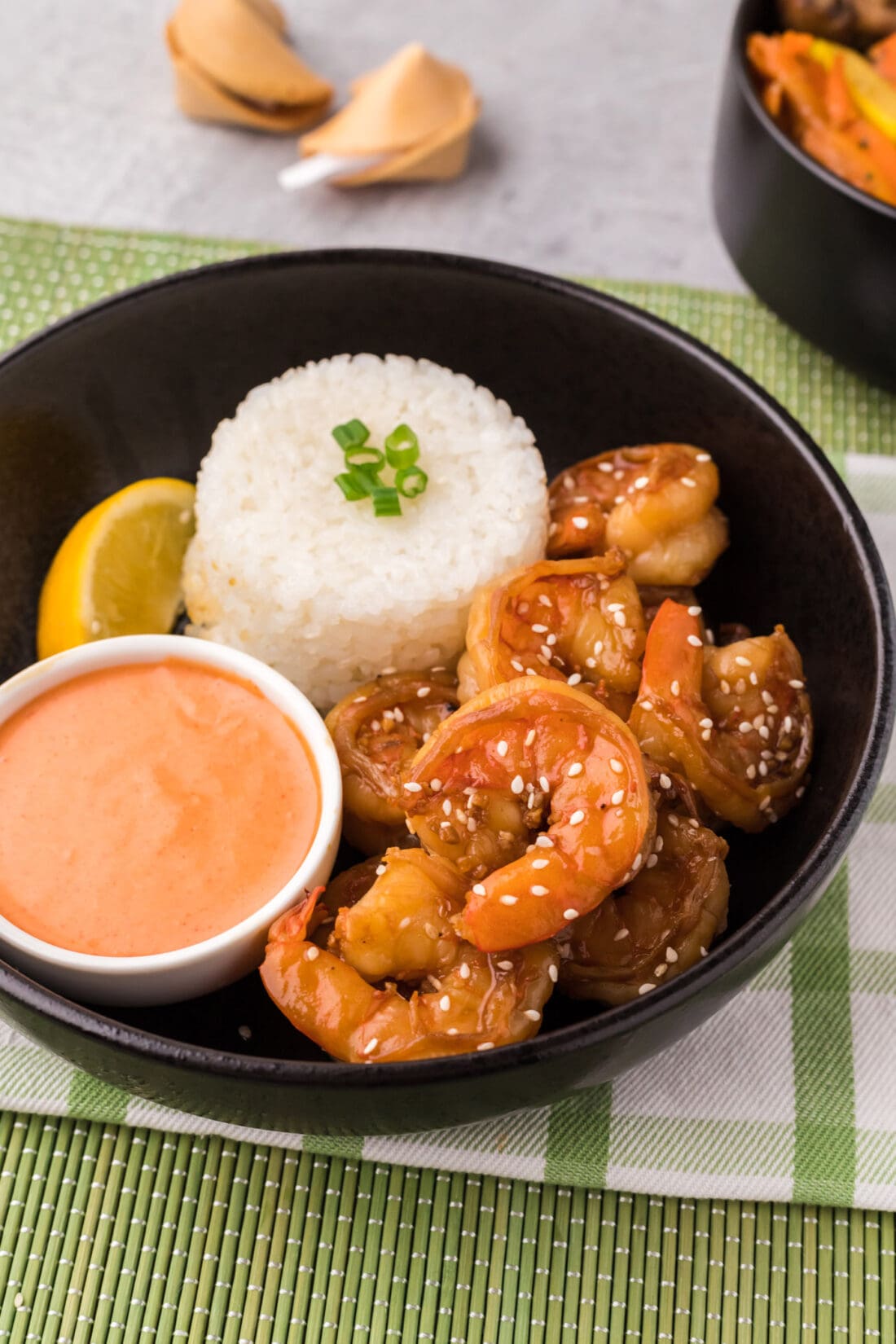 Bowl of Hibachi Shrimp served with rice and Yum Yum Sauce