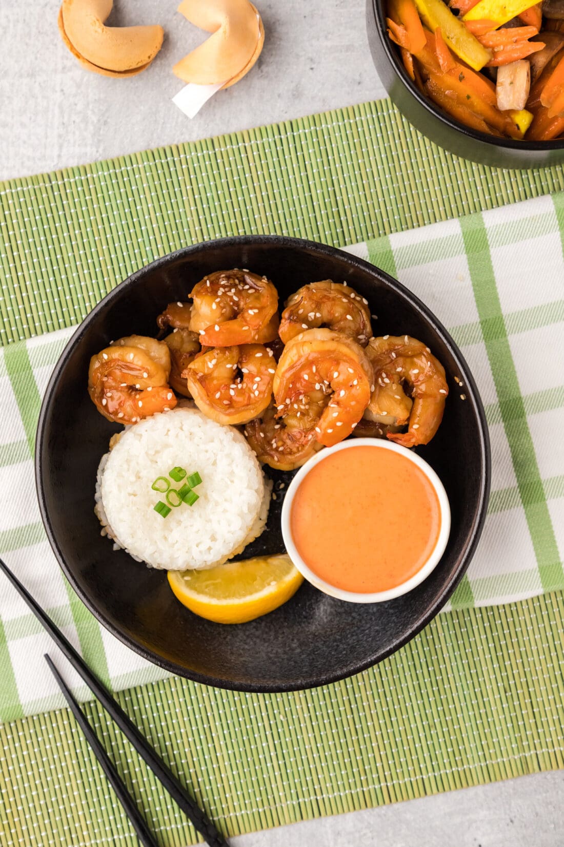 Overhead photo of a bowl of Hibachi Shrimp with rice and Yum Yum Sauce