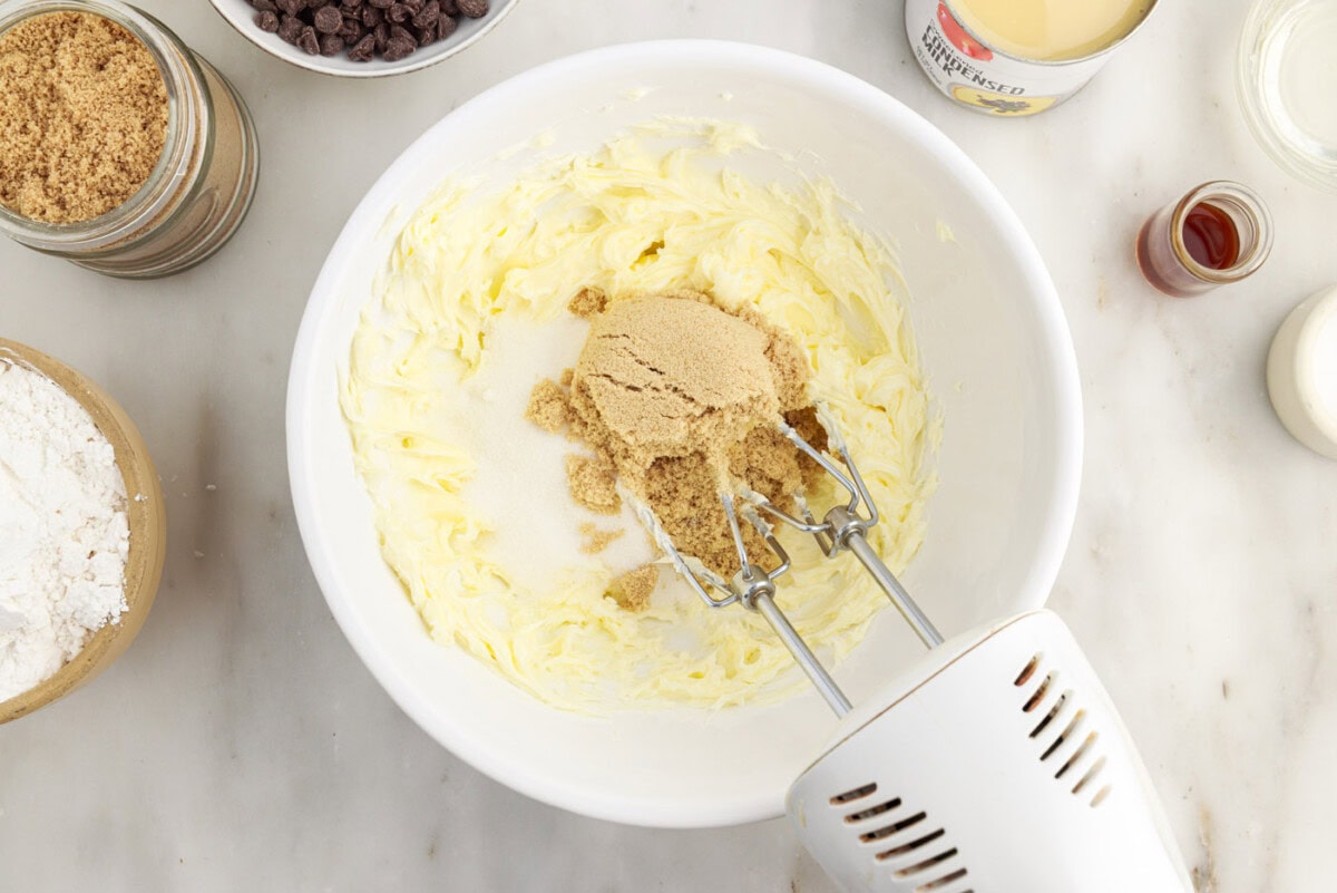 beating butter and sugar with a hand mixer