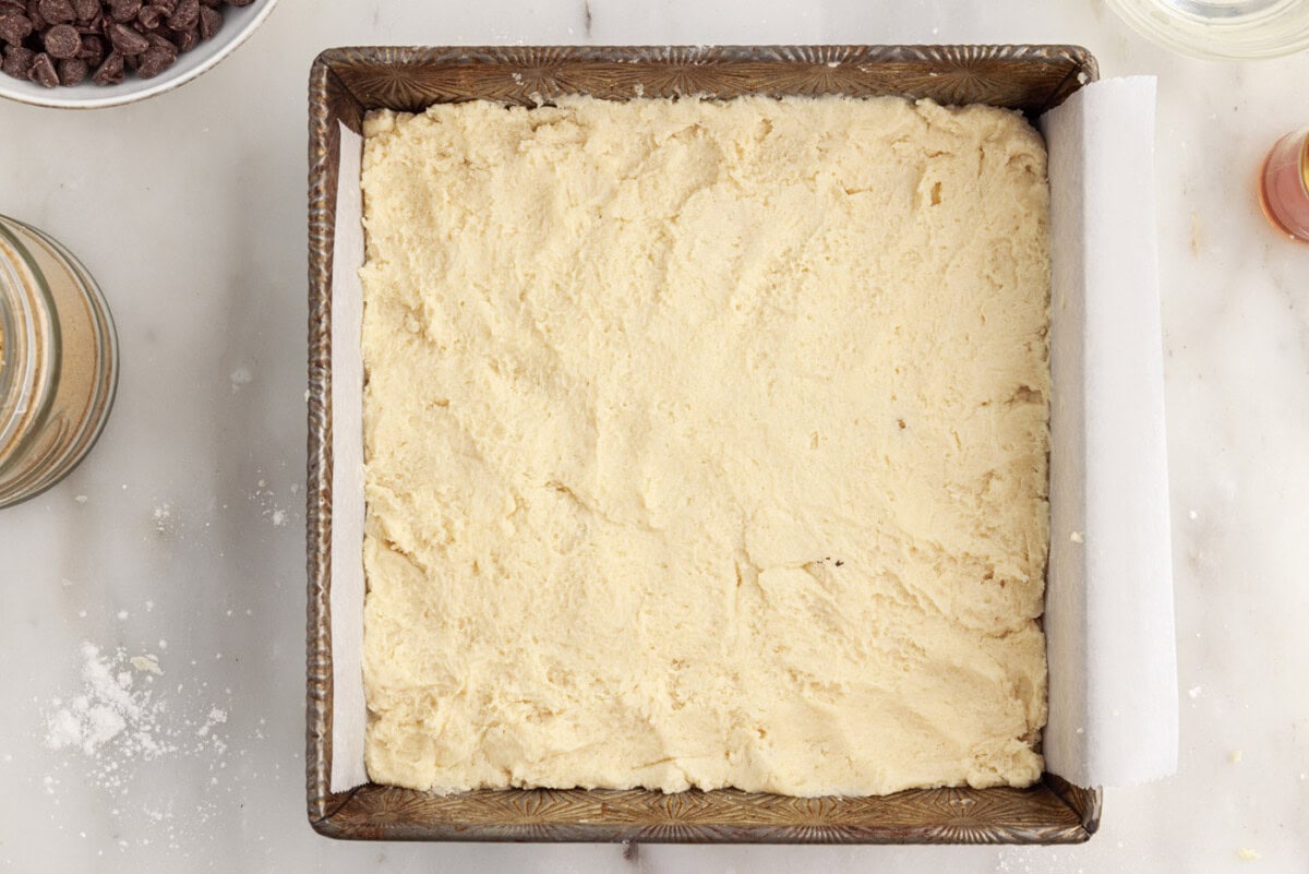 shortbread crust pressed onto bottom of a pan