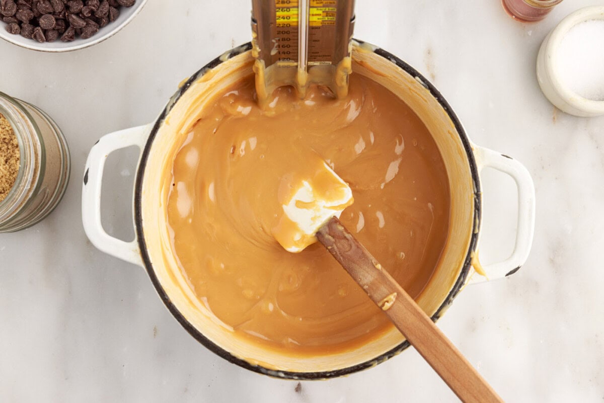candy thermometer in caramel