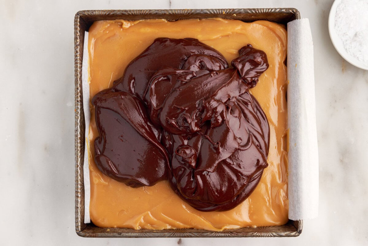chocolate ganache poured over caramel