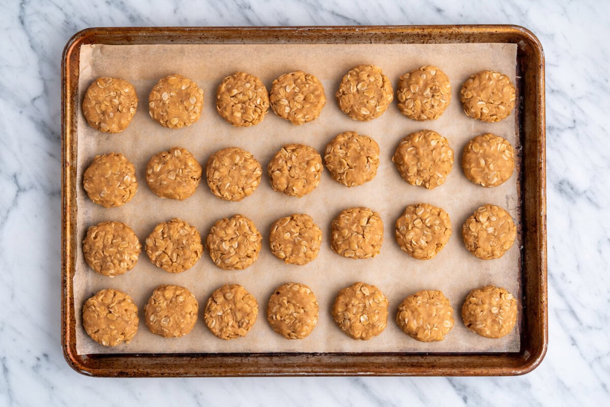 no bake peanut butter cookies on a baking sheet resting