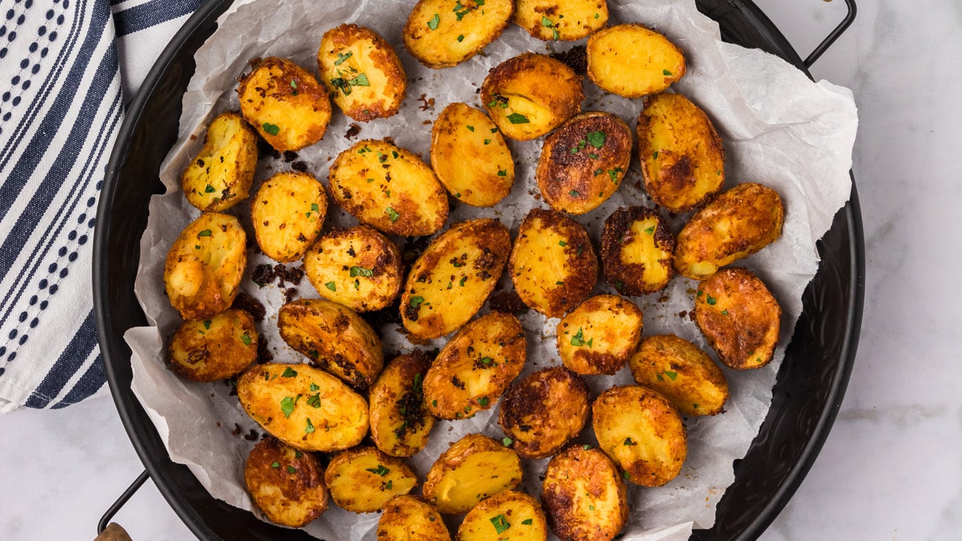 These parmesan potatoes have a soft and creamy texture on the inside with a golden parmesan-crusted 
