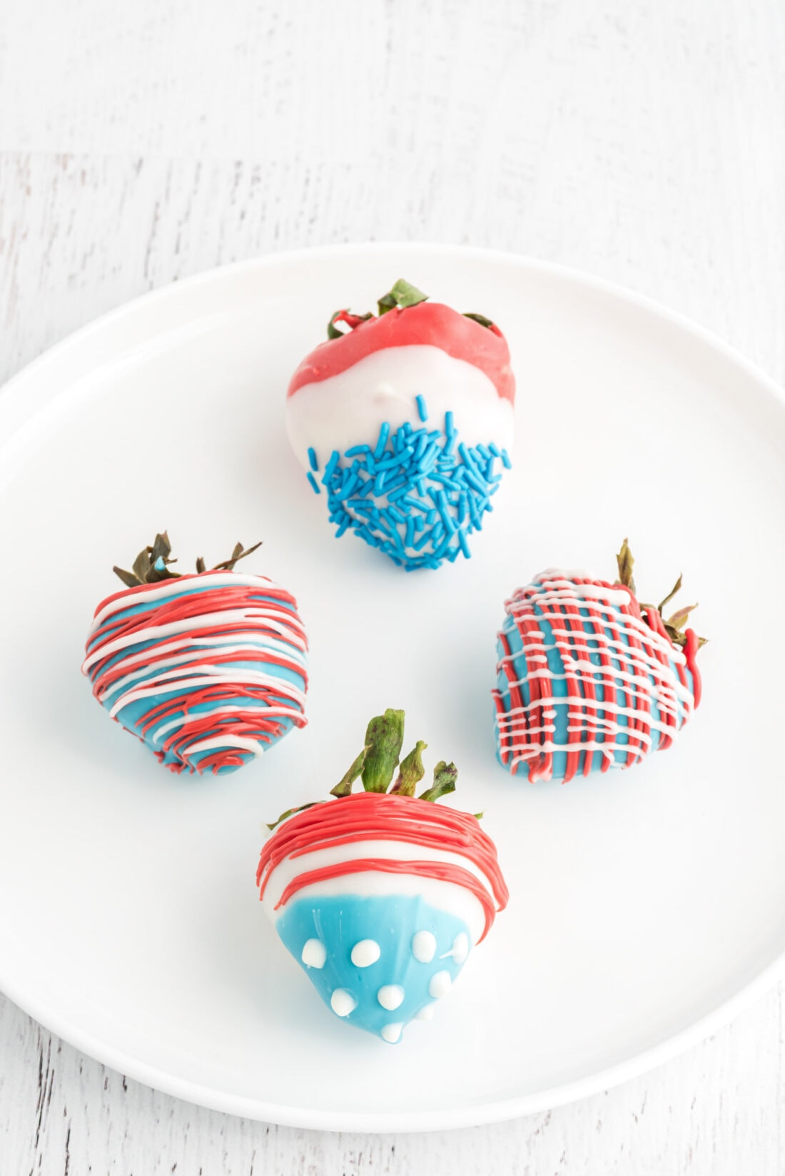 Patriotic Chocolate Covered Strawberries on a plate