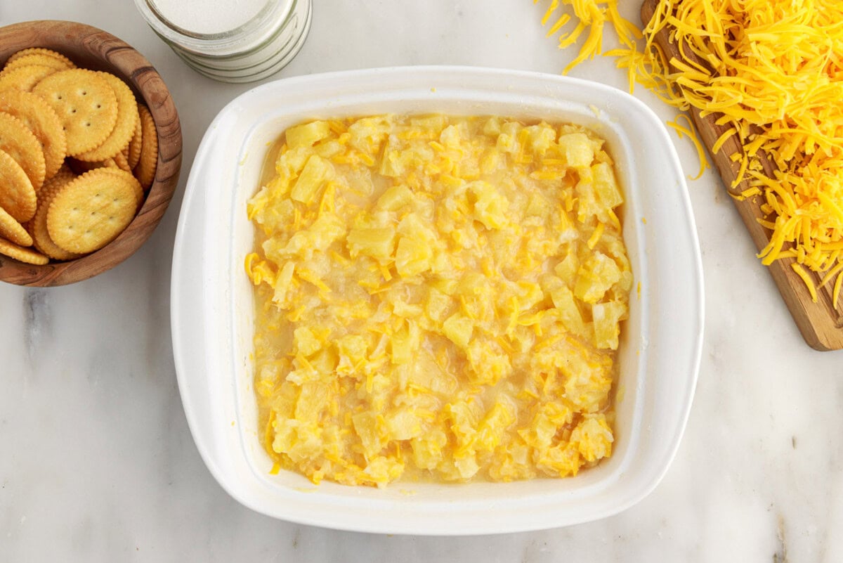 pineapple casserole filling in a baking dish