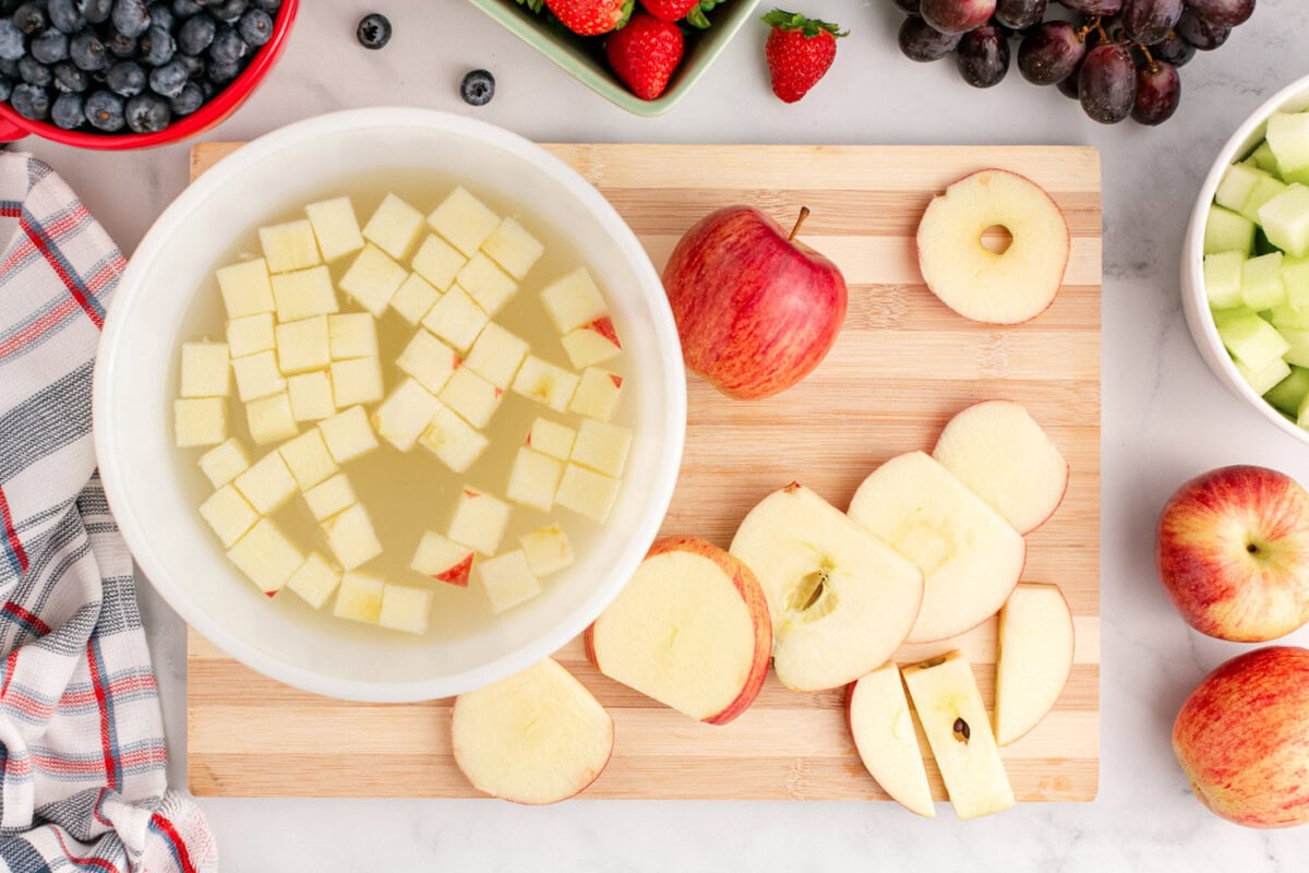 chopped apples soaking in lemon juice water mixture