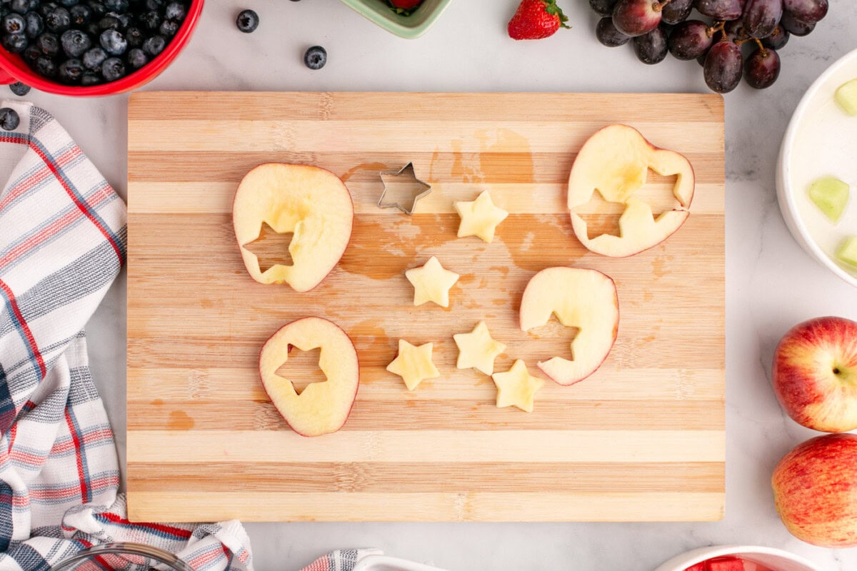 Cutting star shapes out of apples