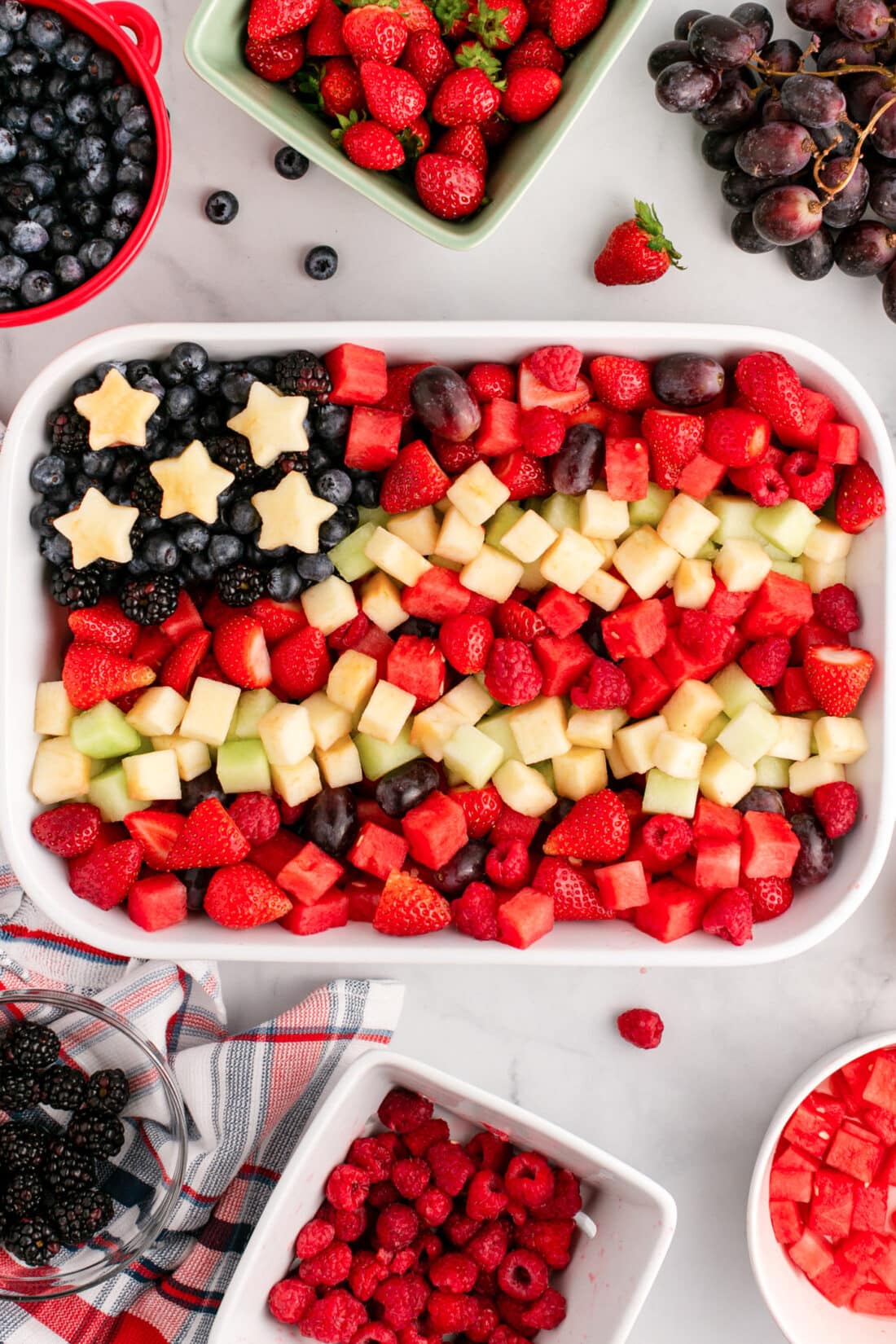 Red White & Blue Fruit Salad in a white serving dish