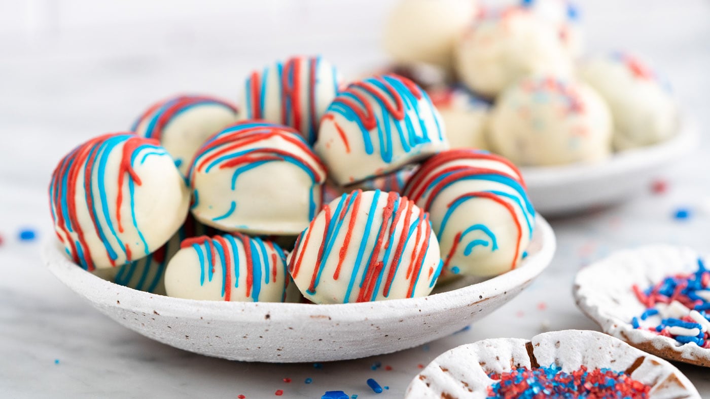 Red white and blue Oreo truffles are an easy patriotic dessert to make for your 4th of July celebrat