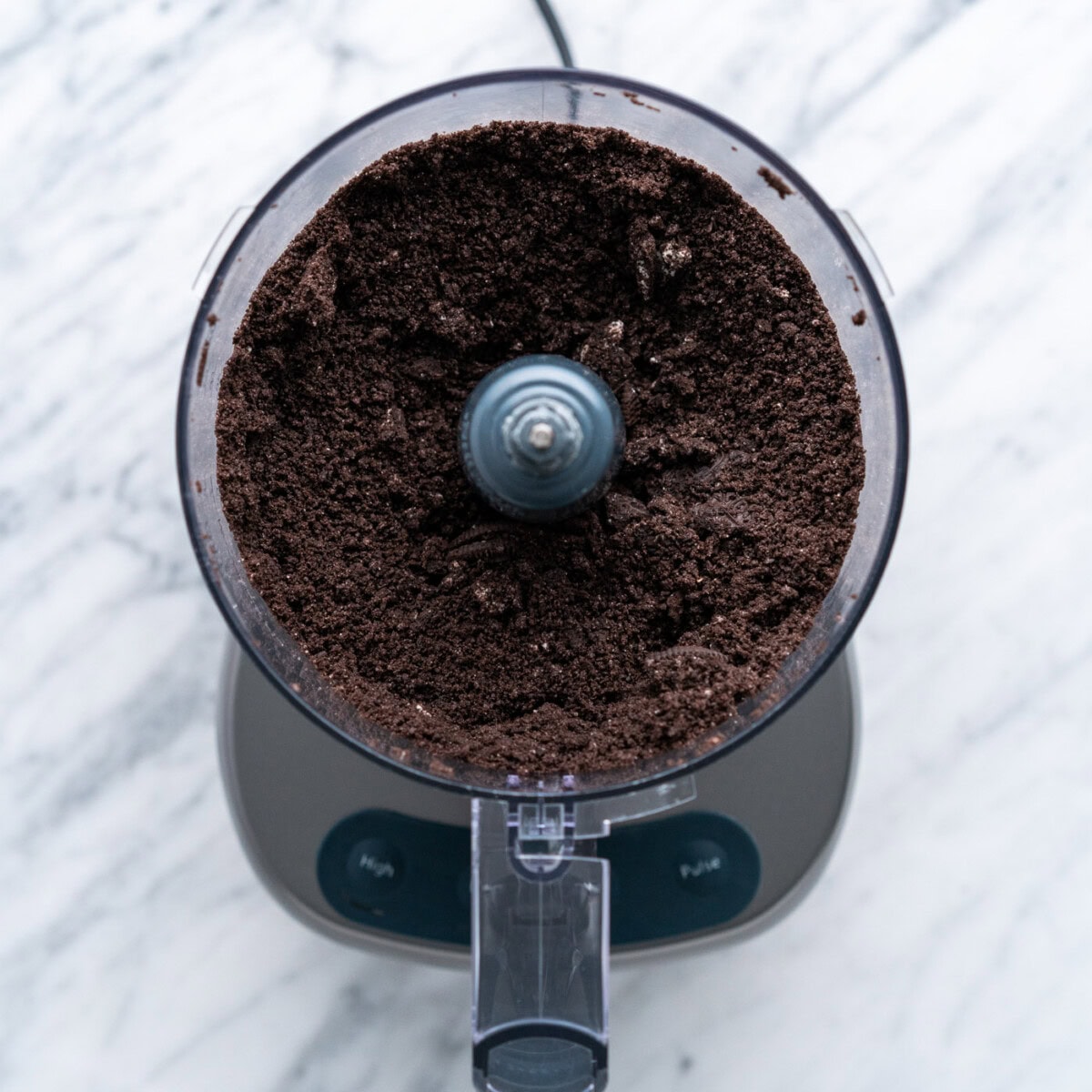 Oreos pulsed into a crumb in a food processor