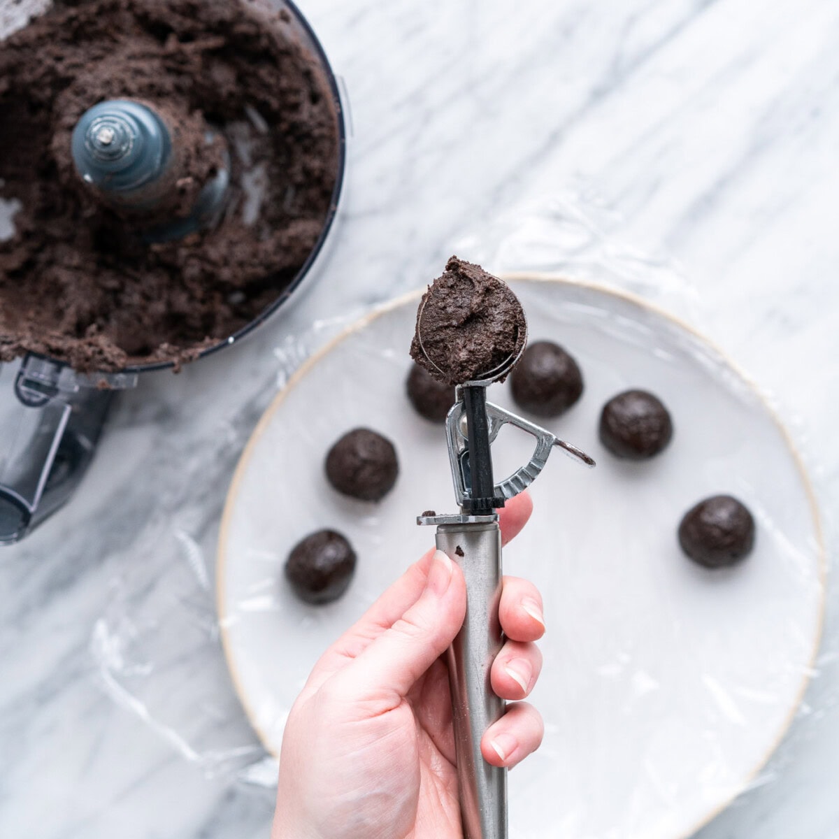 scooping oreo truffles