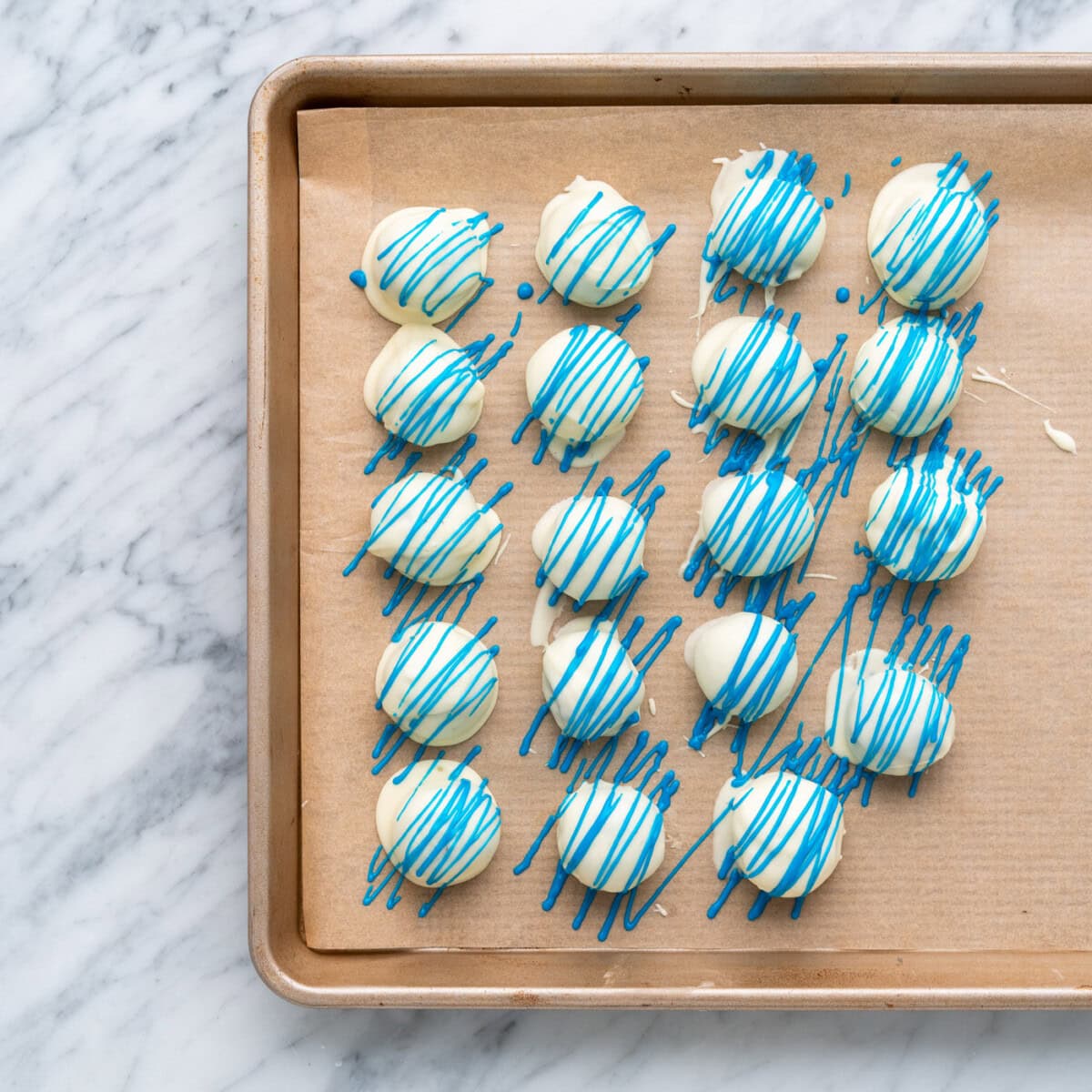 blue drizzle over oreo truffles