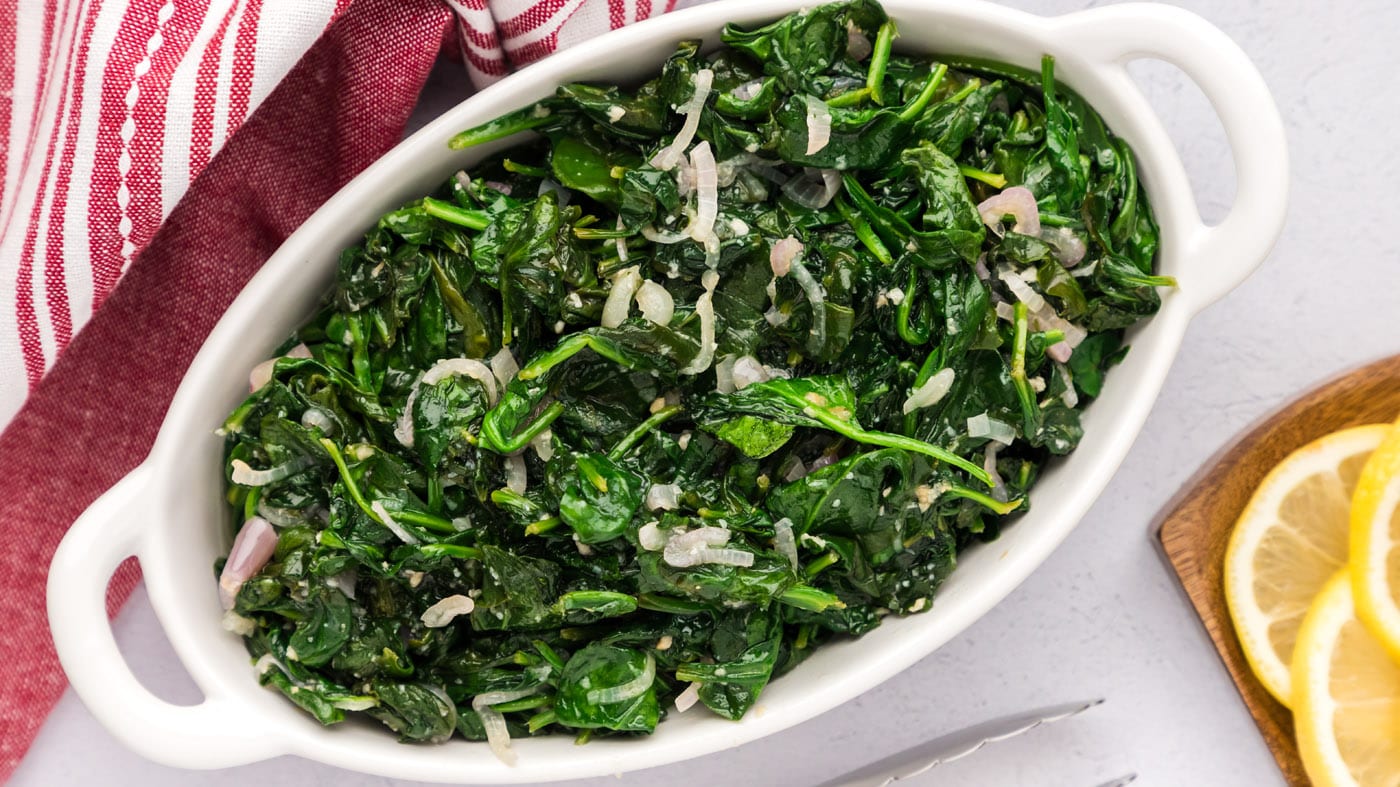 Sauteed spinach is a great way to get your greens in at dinner time with minimal prep. It's one of o