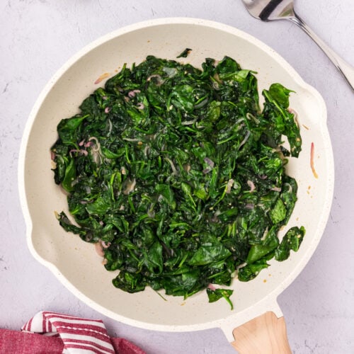 Overhead photo of Sautéed Spinach in a skillet