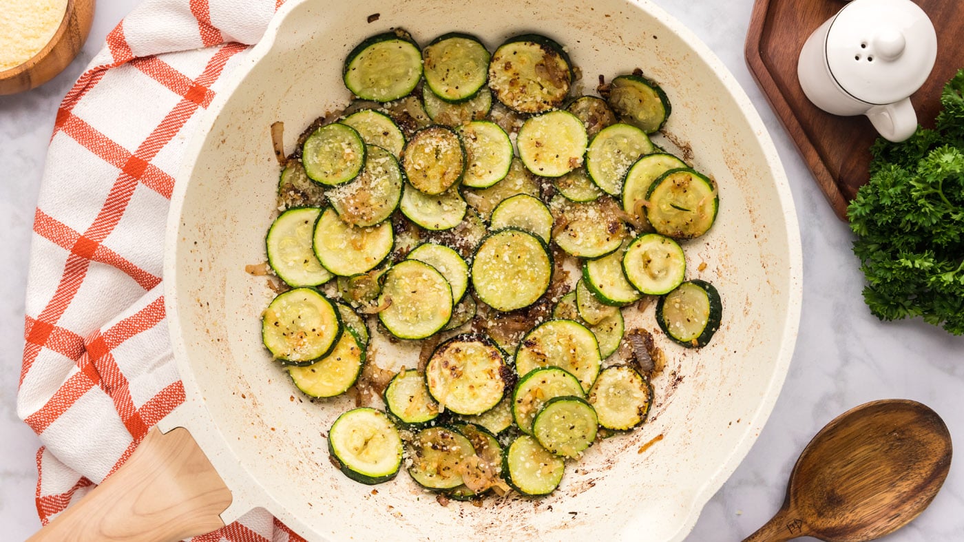 Sauteed zucchini tossed with shallots, garlic, butter, and a taste of salt and pepper make a delicio