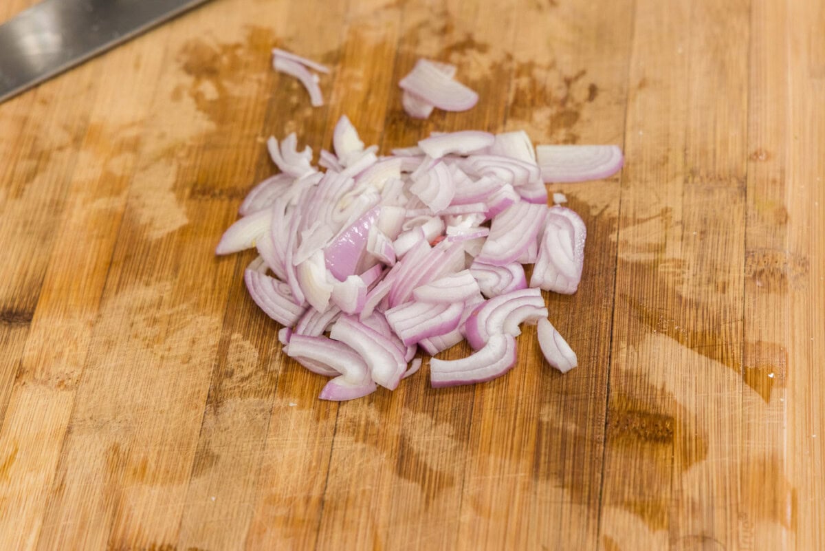chopped shallots on a cutting board