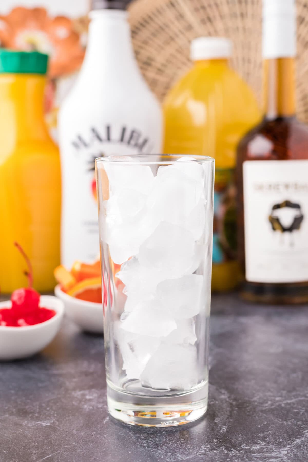 highball glass filled with ice