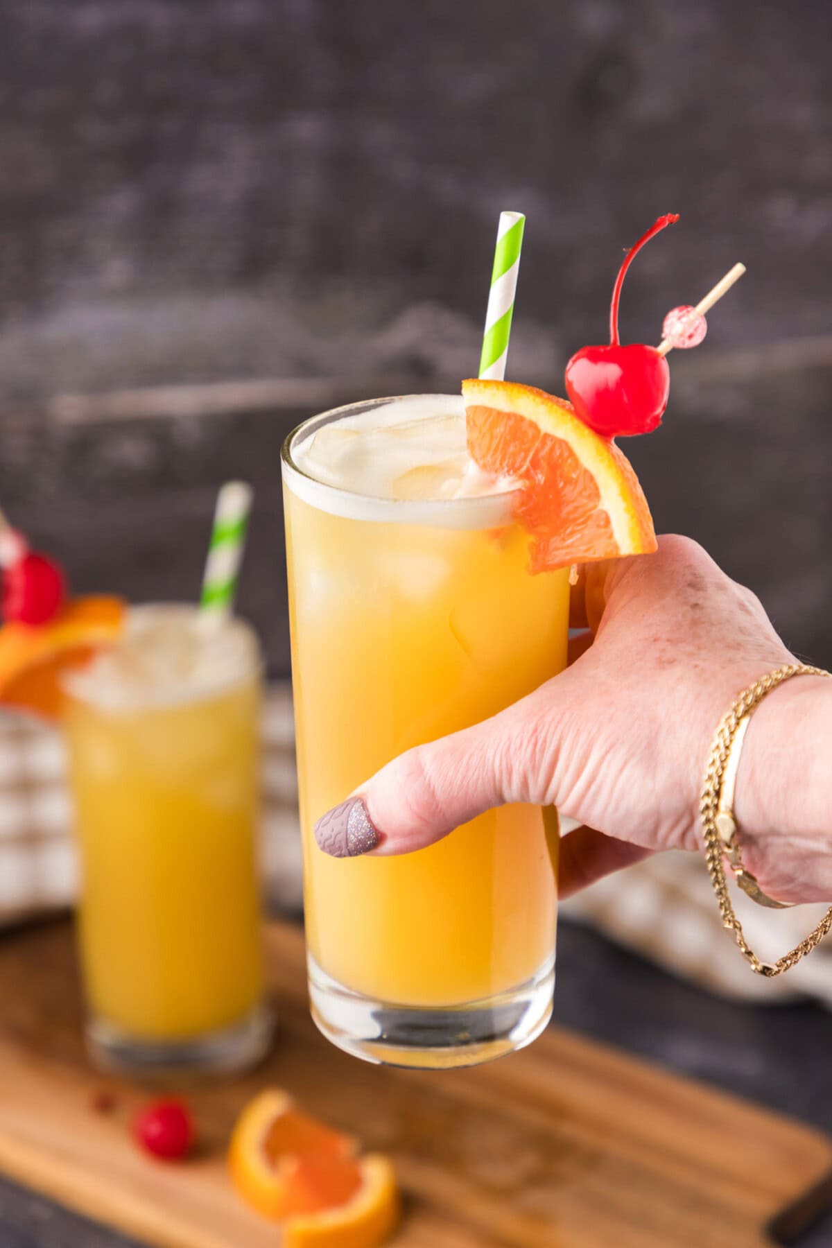 Hand holding up a Skrew Loose Cocktail