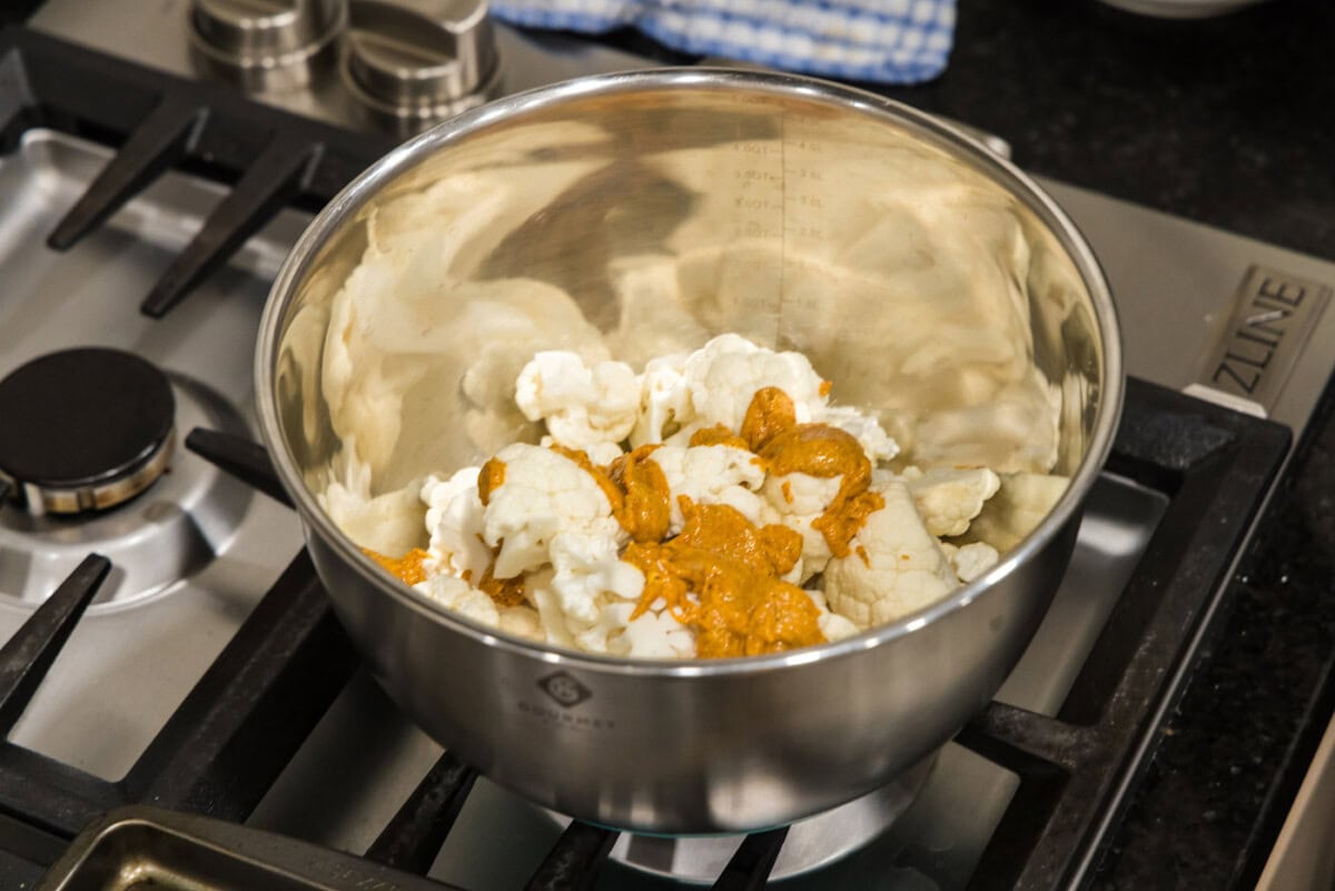 cauliflower florets with spice rub in a bowl