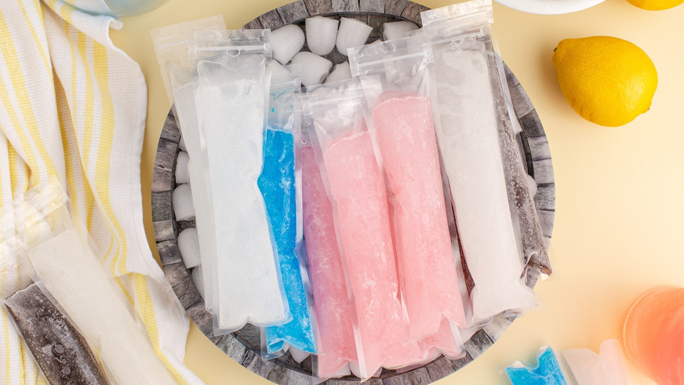 Grab your cooler and a beach towel because these boozy ice pops are the perfect addition to your sum