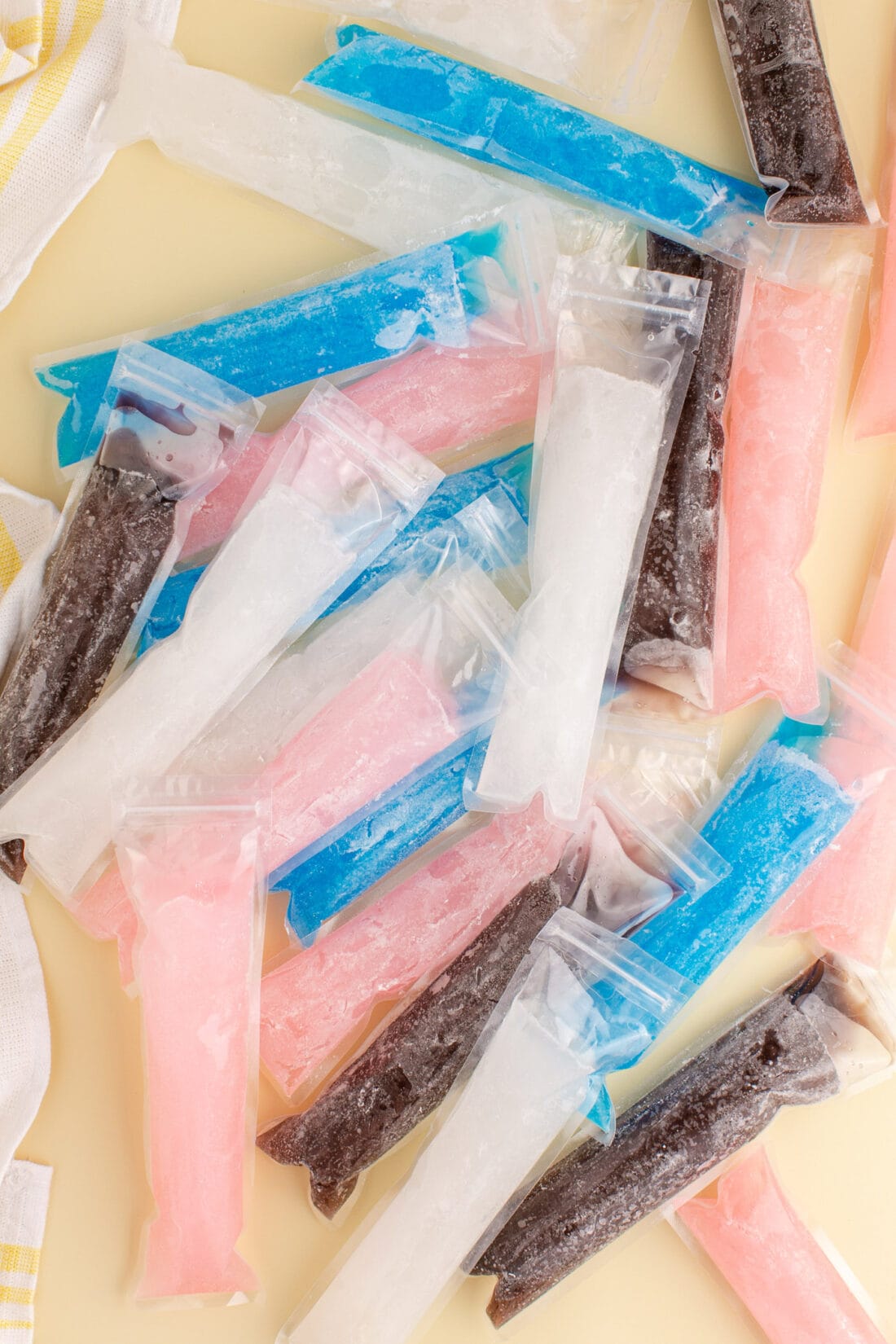 Assorted Boozy Ice Pops laying on a table