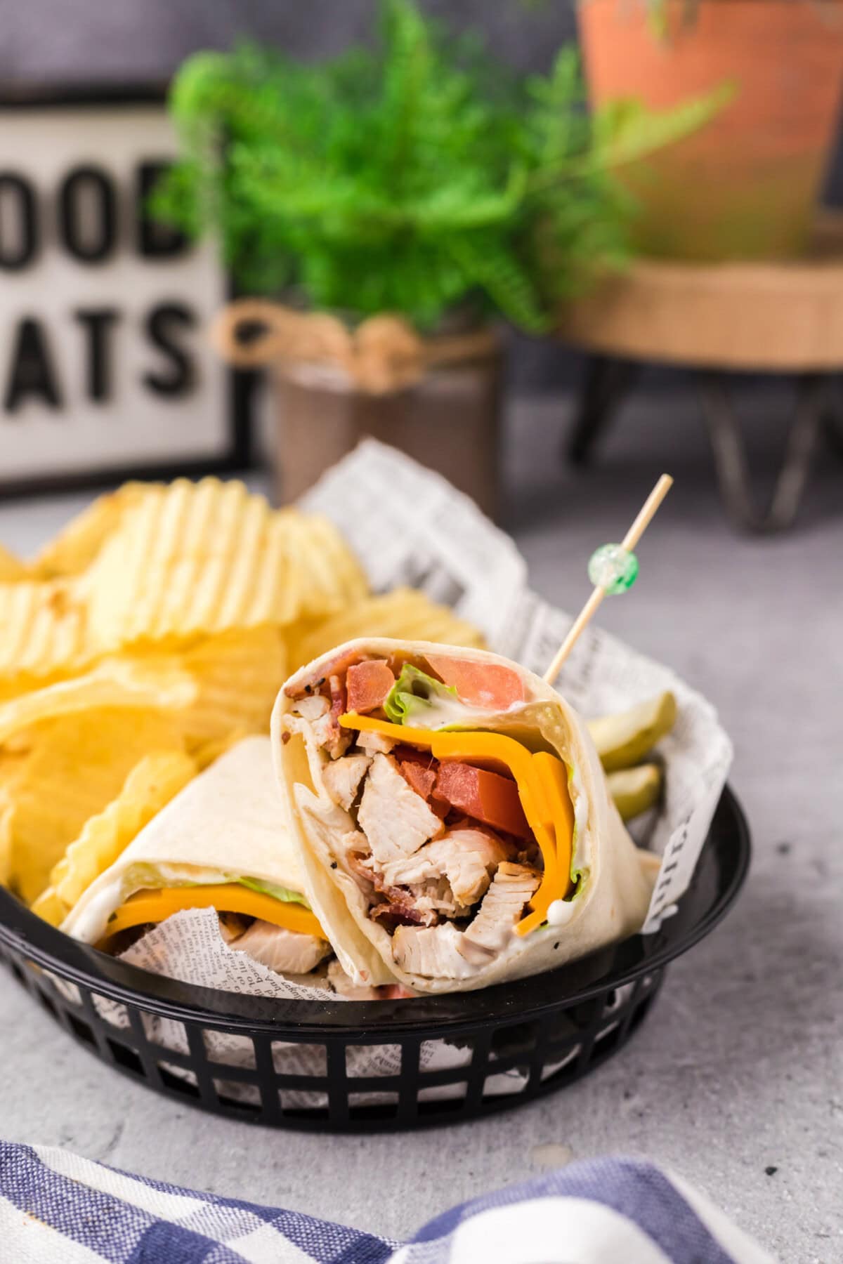 Chicken Bacon Ranch Wrap in a basket with chips