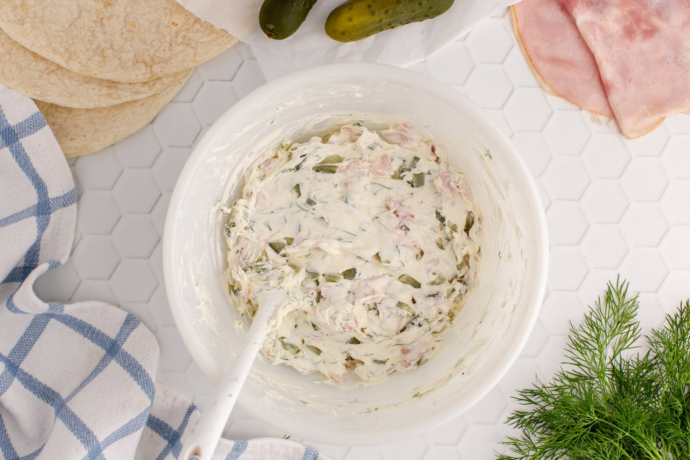 dill pickle cream cheese in a bowl