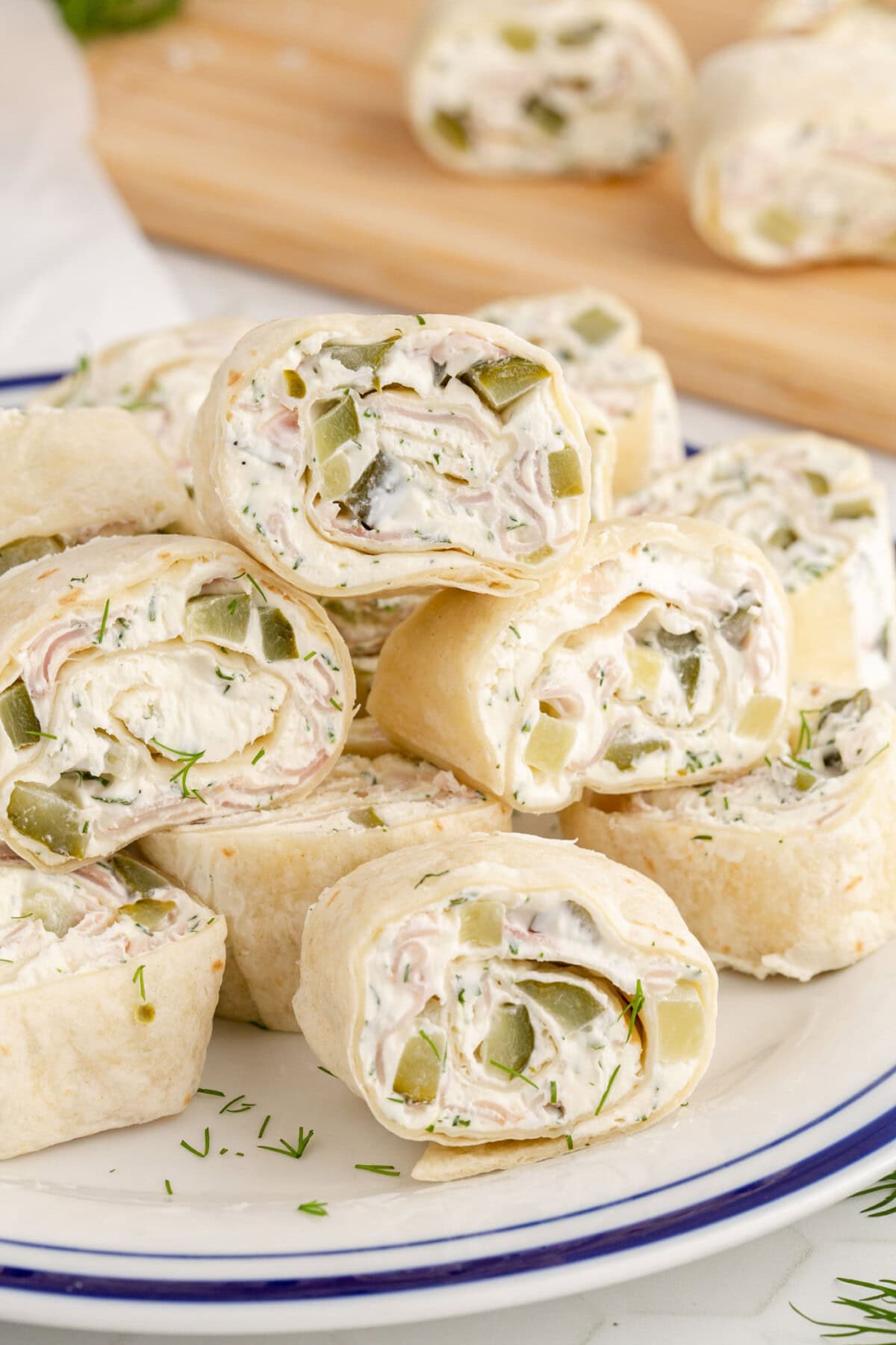 Dill Pickle Pinwheels stacked on a plate