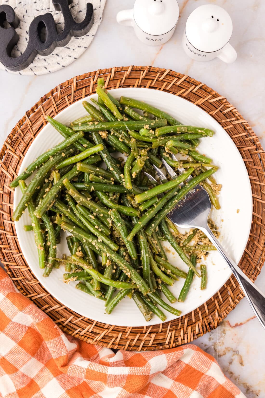 Garlic Green Beans on a plate with a fork