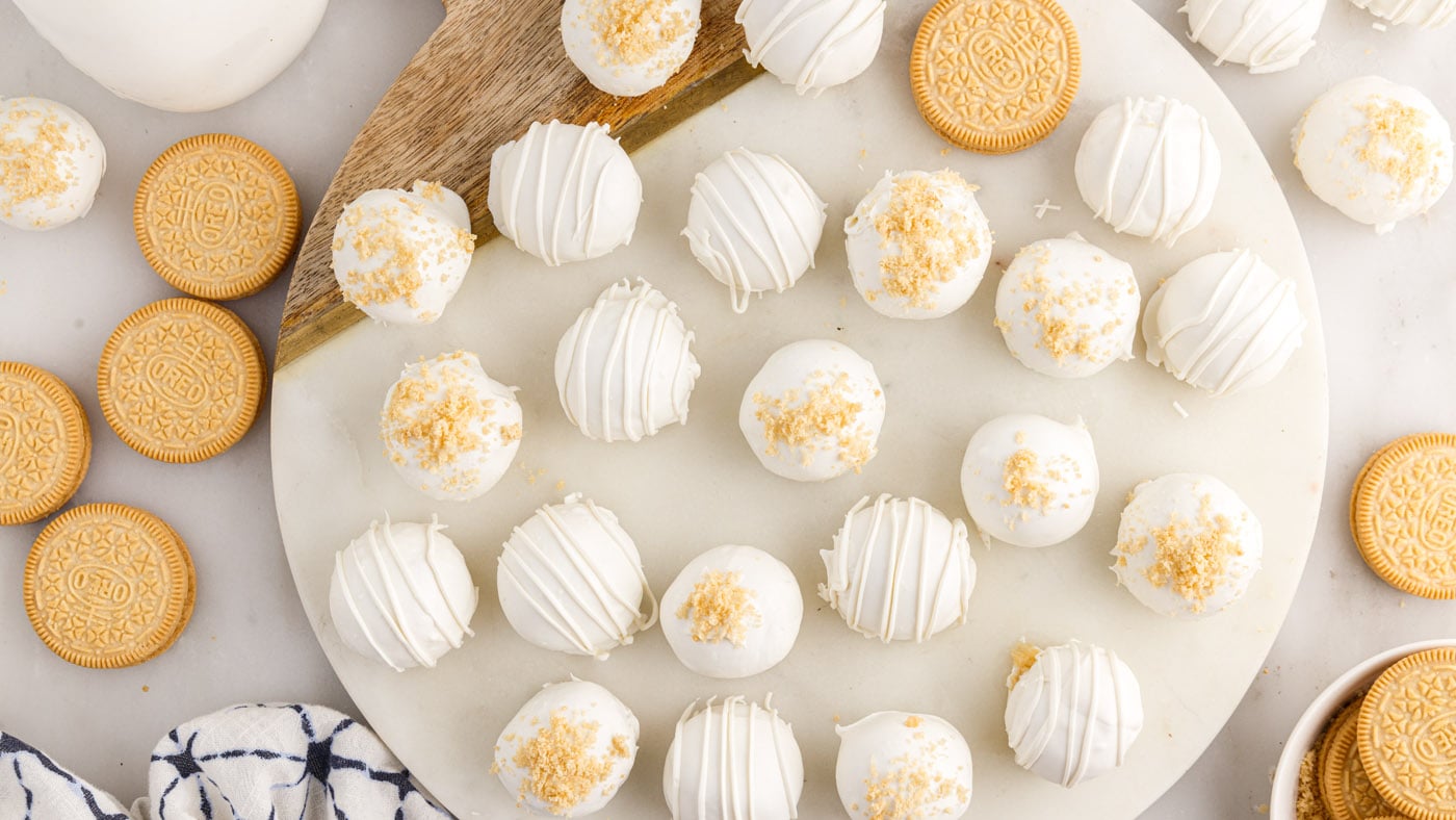 Blitz, roll, and dip into a white chocolate coating. That's all! These golden Oreo truffles are so e