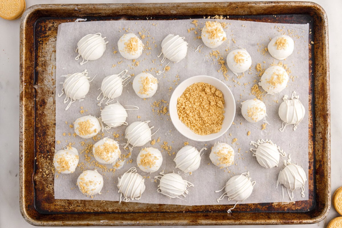 Oreo cookie crumbs sprinkled on top of Oreo balls