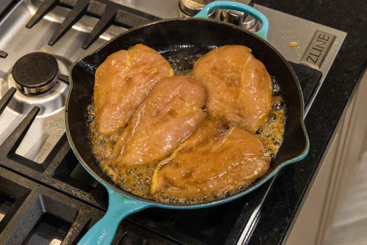 chicken breasts in a skillet