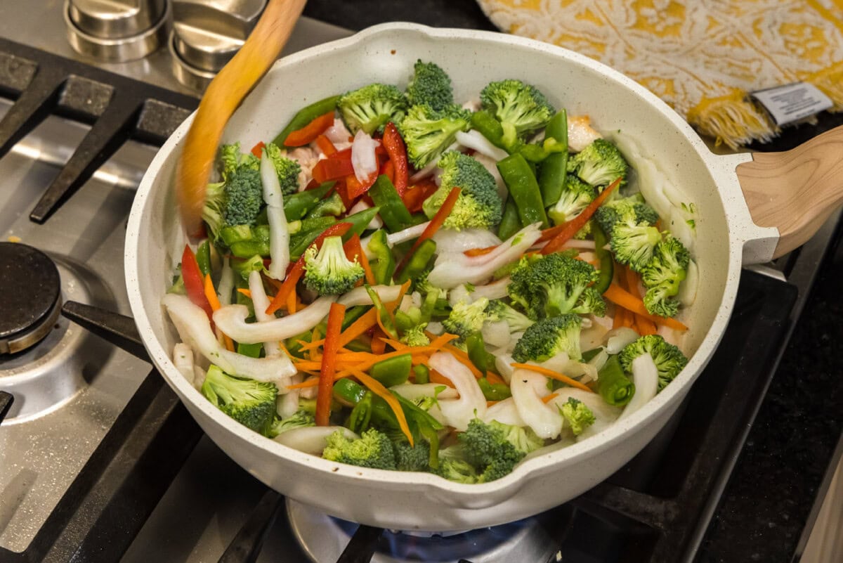 stir fry vegetables in a skillet