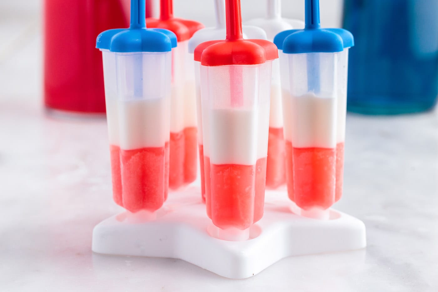 red and white layers for popsicles in a mold