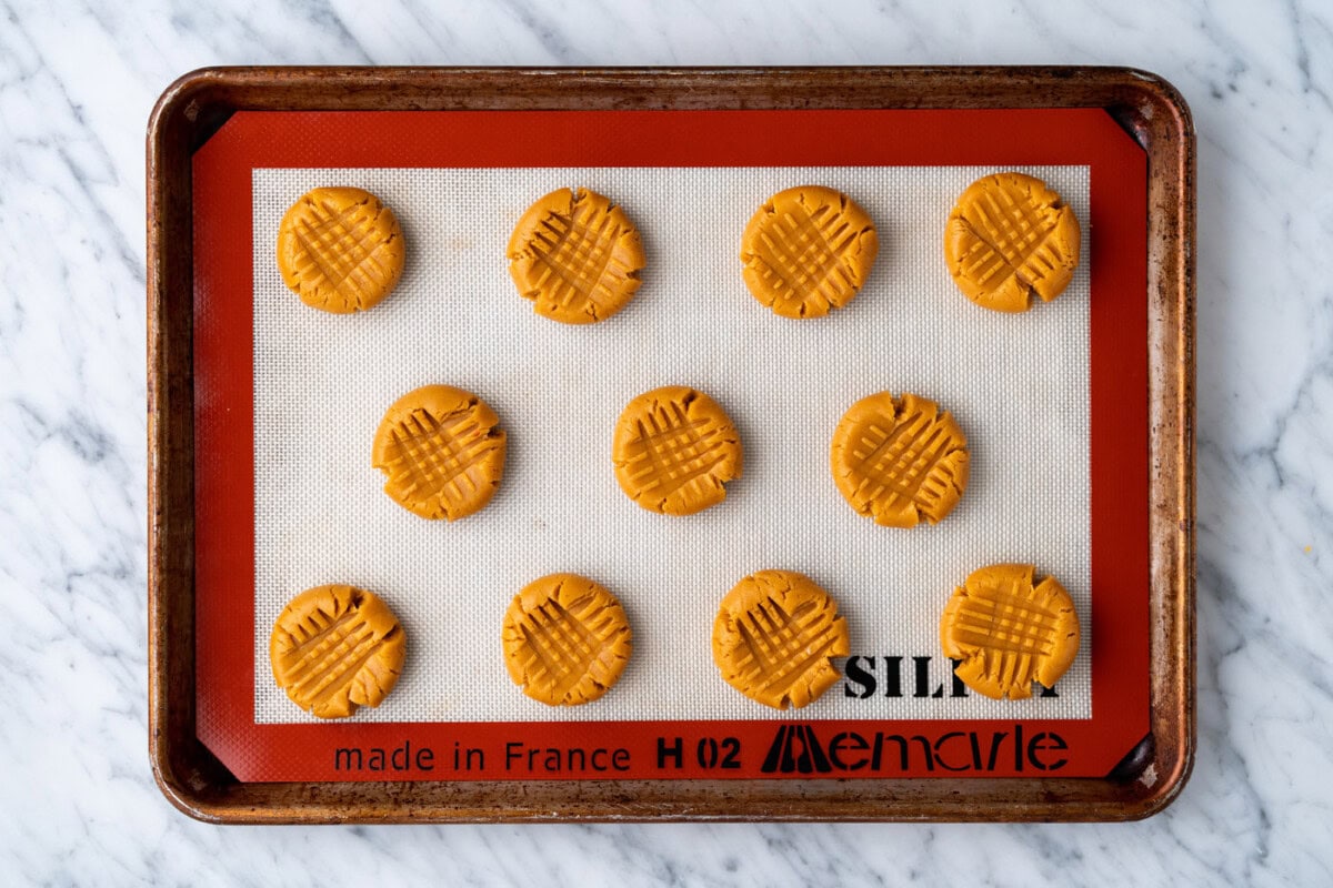 peanut butter cookie dough on a baking sheet