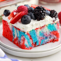 Close up photo of a square piece of Red White and Blue Marble Cake