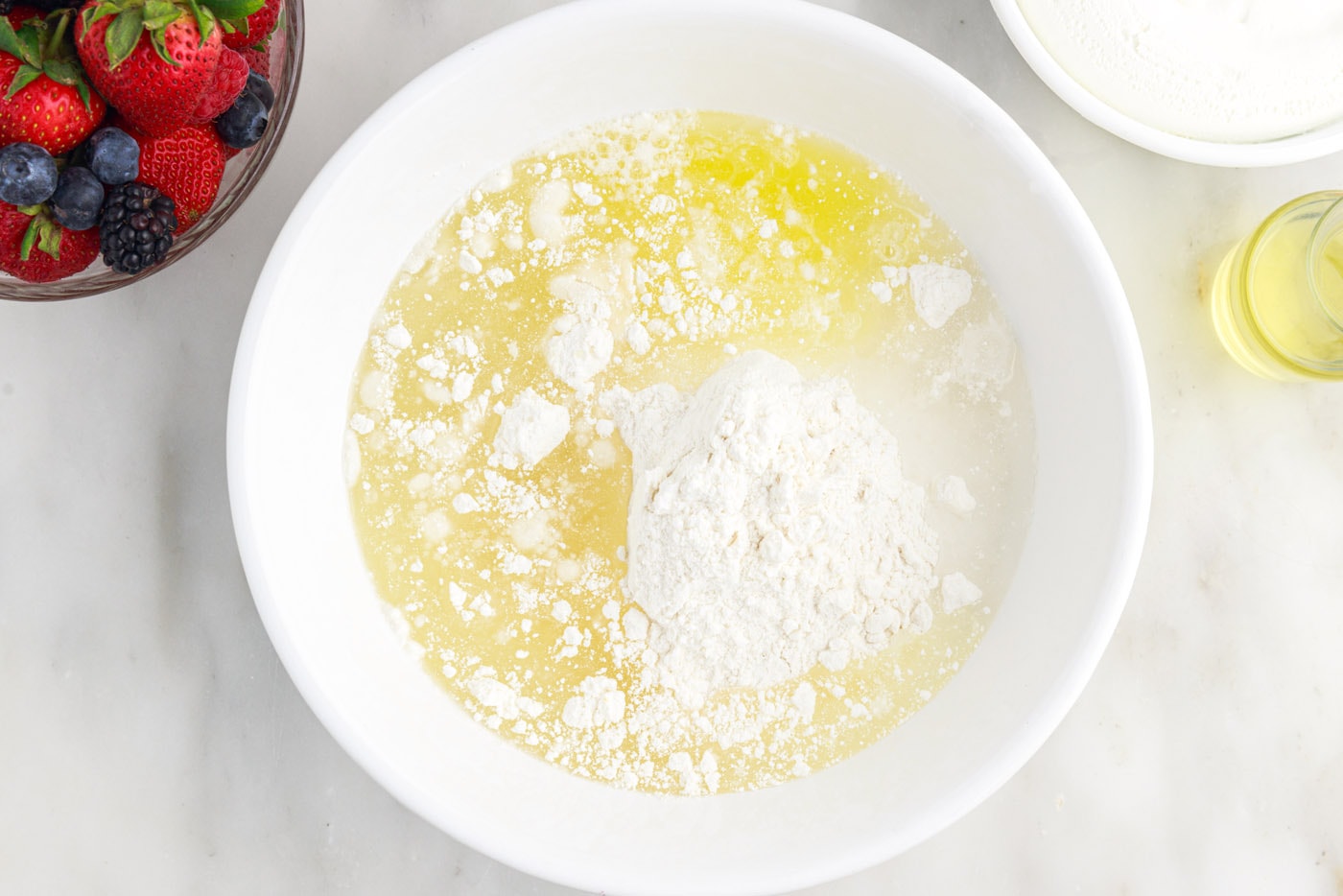 cake mix, oil, and egg whites in a bowl