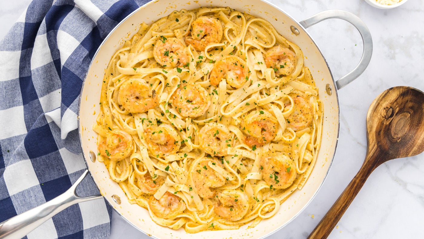 Shrimp alfredo is a classic. It's hard to resist this rich creamy sauce twirled with noodles and plu
