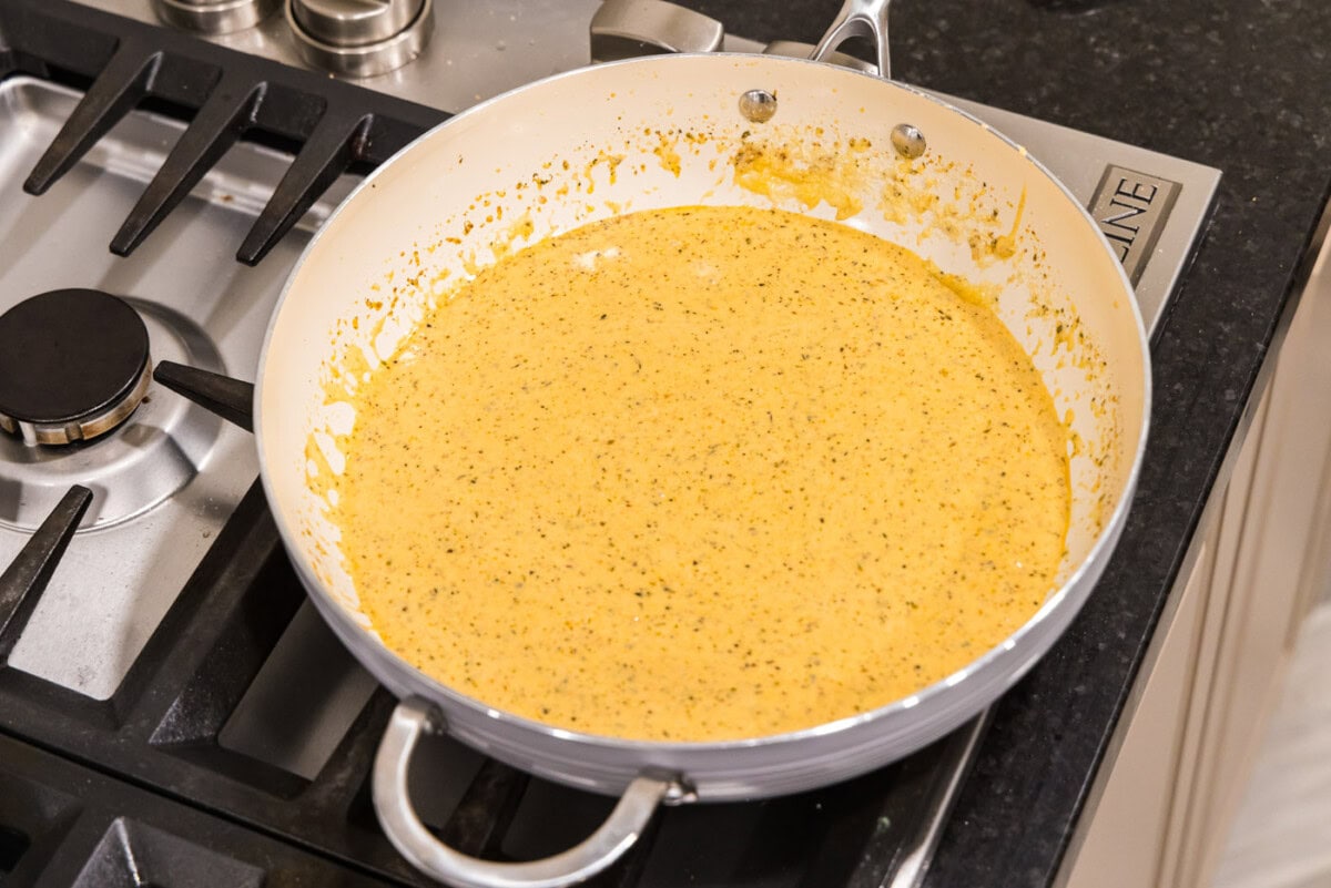 homemade alfredo sauce in skillet