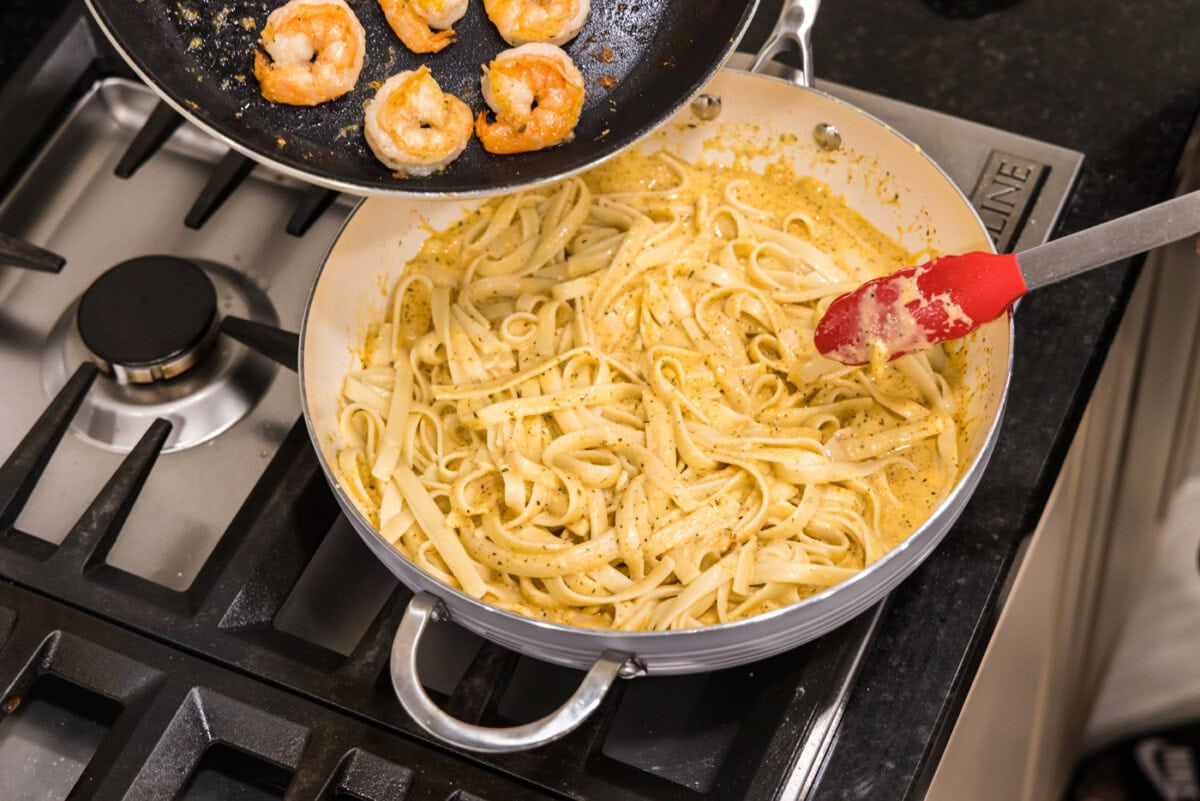 adding shrimp to fettuccine alfredo