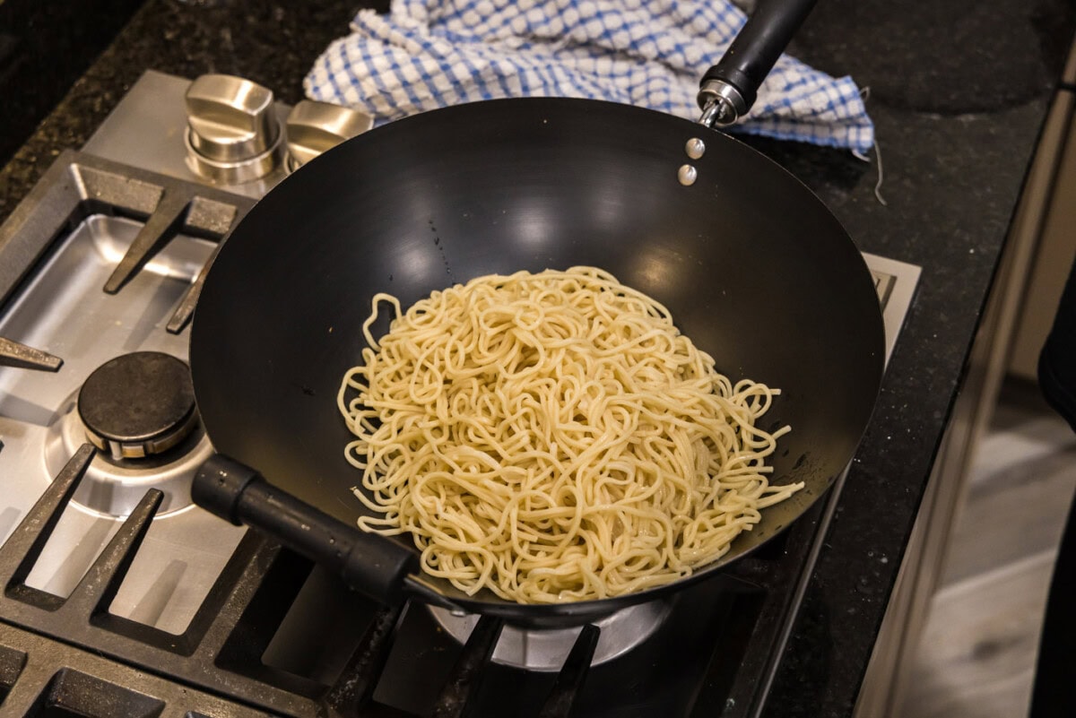 lo mein noodles in a wok